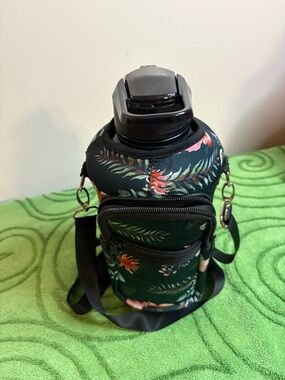 2000 ml plastic water bottle with two cases. Both with phone pockets , straps